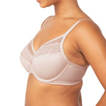 Side view of Triumph’s nude pink Sheer Minimiser Bra, showing soft cup structure and geometric lace—exclusively at The Foundation.