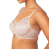 Side view of Triumph’s nude pink Sheer Minimiser Bra, showing soft cup structure and geometric lace—exclusively at The Foundation.