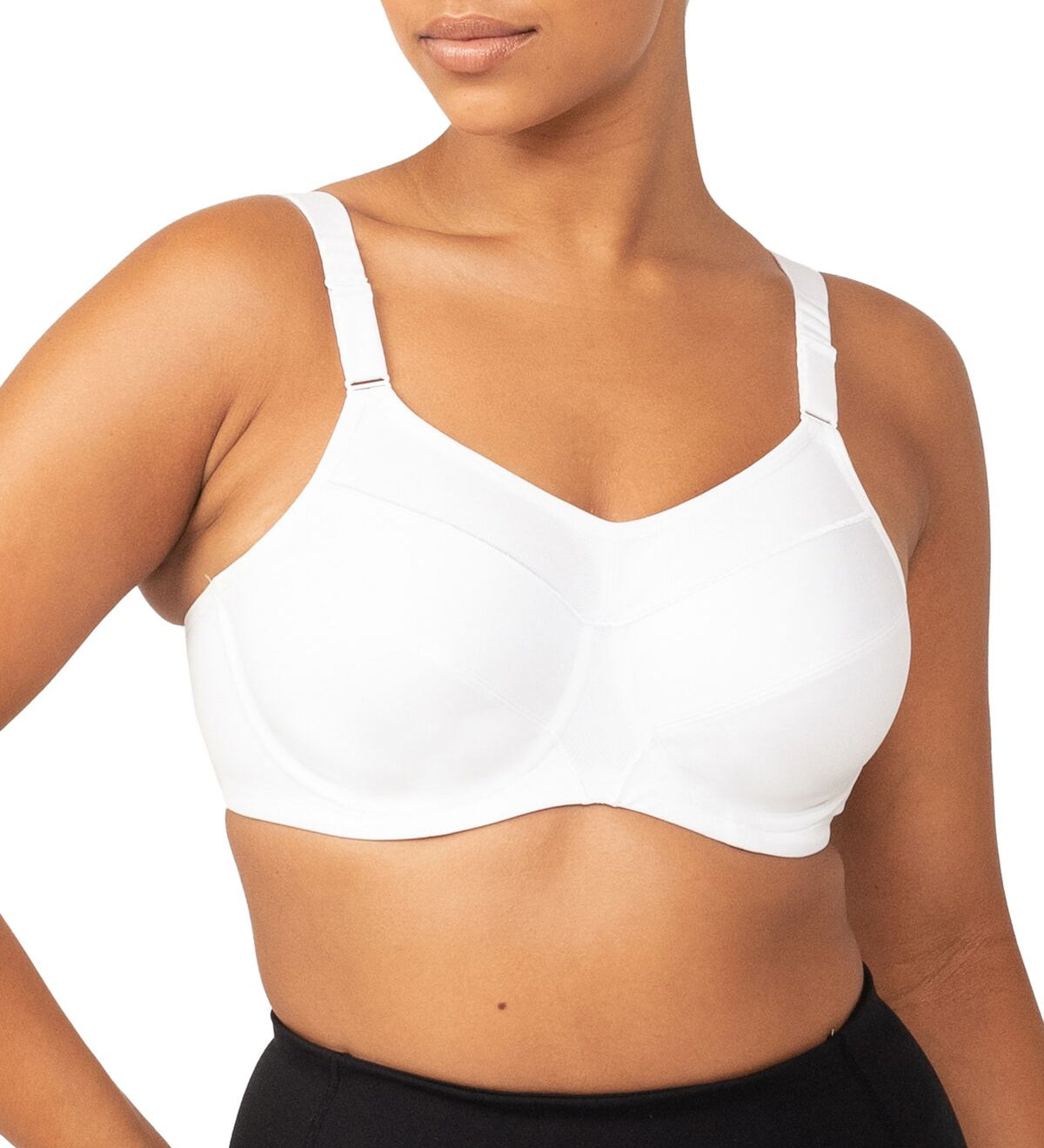 Front view of the Triaction Ultra W Sports Bra in White, showing supportive fit for high-impact workouts.