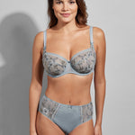 Model wearing the Lauren Sky Blue brief with matching underwire bra, showcasing full coordinated lingerie set.