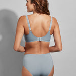 Back view of the Empreinte Lauren high-waisted brief in Sky Blue, highlighting smooth fit and delicate embroidery.