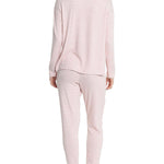 Back view of the long sleeve top and joggers set, showcasing fit and pink striped fabric texture.