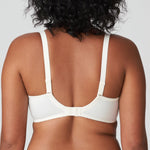 back view of Wacoal Raffine Chemise Black on model showing adjustable straps and elegant lace trim.