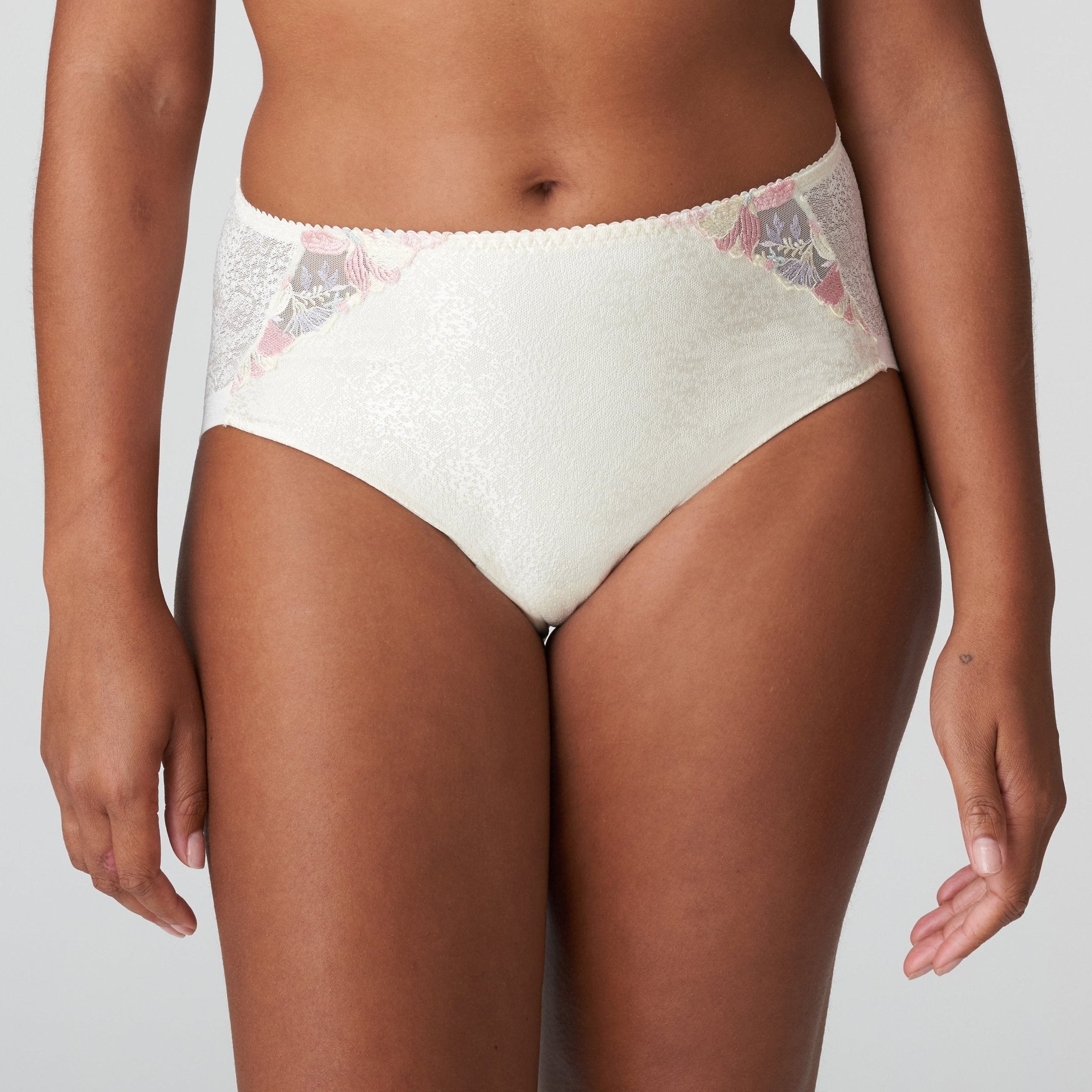 Front view of Prima Donna Mohala Full Briefs Vintage Natural on model showing high-waisted fit and pastel floral embroidery.