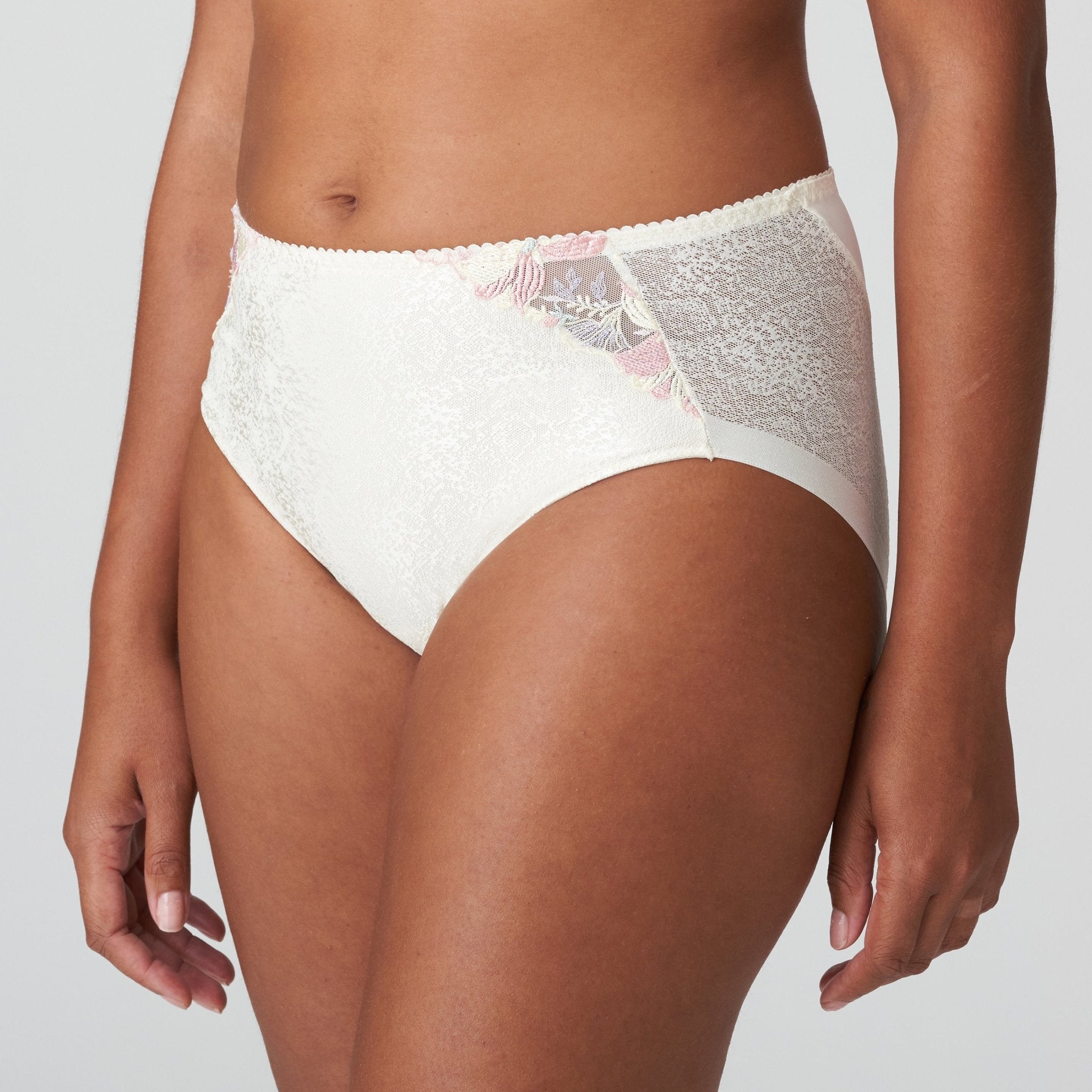 Side angle of model in Mohala Full Briefs Vintage Natural by Prima Donna featuring lace texture and seamless design.