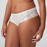 Side angle of Prima Donna Mohala Luxury Thong Brief Vintage Natural on model highlighting buttery soft fit and detailed lace embroidery.