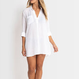 The Foundation’s Sunseeker Resort Painters Shirt in White – lightweight cotton beach shirt with relaxed v-neck and chest pocket, styled for coastal comfort.