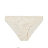 Flat lay of Reve Bikini Brief Sakura Pink from The Foundation – delicate lace front, cotton gusset, and modern mesh rear.