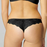 Back view of Reve Tanga Thong Brief Black from The Foundation – scalloped lace detailing and G-string silhouette.