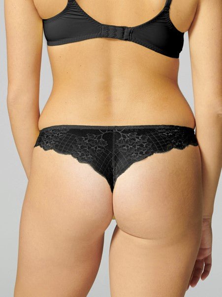 Back view of Reve Tanga Thong Brief Black from The Foundation – scalloped lace detailing and G-string silhouette.