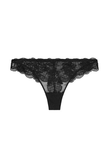 Flat lay of Reve Tanga Thong Brief Black from The Foundation – delicate black lace with cotton gusset for breathable wear.