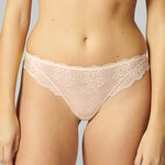 Front view of Reve Tanga Thong Brief Sakura Pink from The Foundation – delicate scalloped lace design with soft waistband.