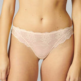 Front view of Reve Tanga Thong Brief Sakura Pink from The Foundation – delicate scalloped lace design with soft waistband.