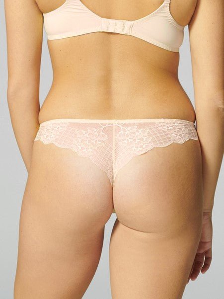Back view of Reve Tanga Thong Brief Sakura Pink from The Foundation – full lace back with elegant curve-hugging scalloped edge.