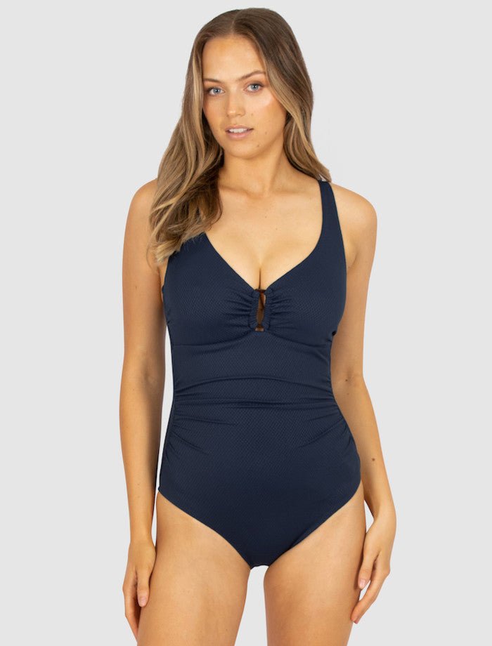 Front view of Baku Rococco D–E Ring Front One Piece Swimsuit in Nightfall navy, with flattering ruching and full bust support at The Foundation.