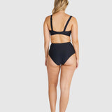 Back view of model in Baku Rococco EFG Cup Bra Nero and matching bottoms, highlighting convertible straps and supportive design.