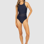 Model in full-length view wearing Baku Rococco High Neck One Piece in Nightfall navy, designed for support and elegance at The Foundation.