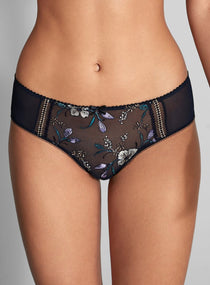 Close up of Empreinte Lauren Shorty Brief Night Magic on model featuring floral embroidery and decorative stitching.