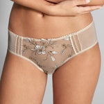 Close up of Empreinte Lauren Shorty Brief Or Ancien Ivory on model showing delicate embroidery and seamless fit