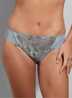 Close-up of the Empreinte Lauren Thong Brief in Sky Blue, showcasing shimmering floral embroidery and satin bows.