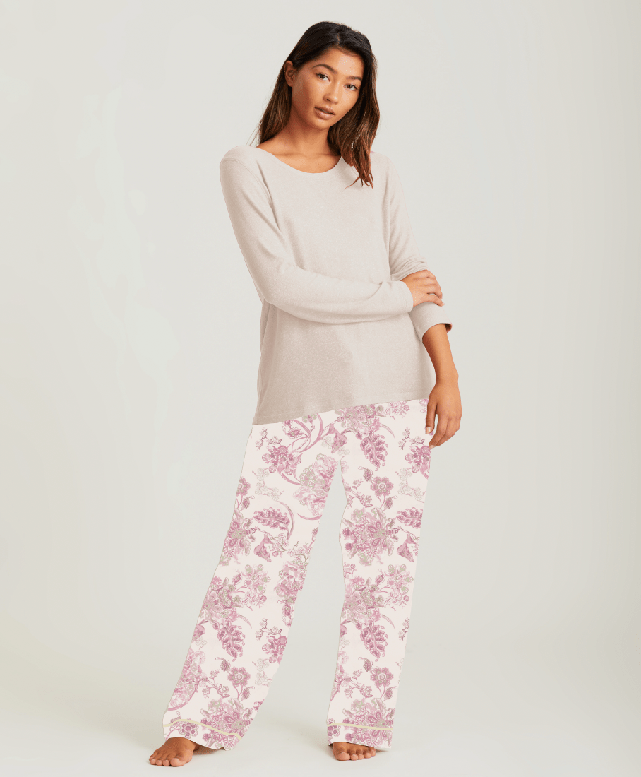 Papinelle Coco Feather Soft PJ Set in Pink and Ecru, featuring a long sleeve scoop neck top and relaxed wide-leg floral pants – available at The Foundation.