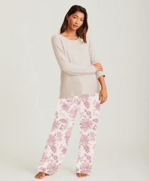 Papinelle Coco Feather Soft PJ Set in Pink and Ecru, featuring a long sleeve scoop neck top and relaxed wide-leg floral pants – available at The Foundation.