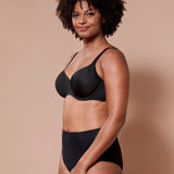Virginia Spacer Bra in Black shown on model, featuring seamless cups and supportive spacer fabric.