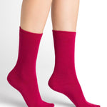 Model wearing Wool Cashmere Socks Mid Fuschia Pink by Bleuforêt, available at The Foundation, featuring soft, warm, and colourful socks for women.