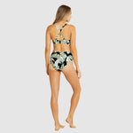 Back view of high-waist mid bikini bottom in leafy monochrome print with full coverage fit.