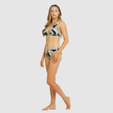 Side profile of mid-rise bikini bottom with bold leaf print and soft leg line.