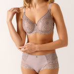 Model wearing Empreinte Cassiopee bra in Rose Sauvage, showcasing seamless full coverage and luxe embroidery.