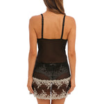 Back view of Wacoal’s lace chemise featuring mesh panel and adjustable straps—The Foundation