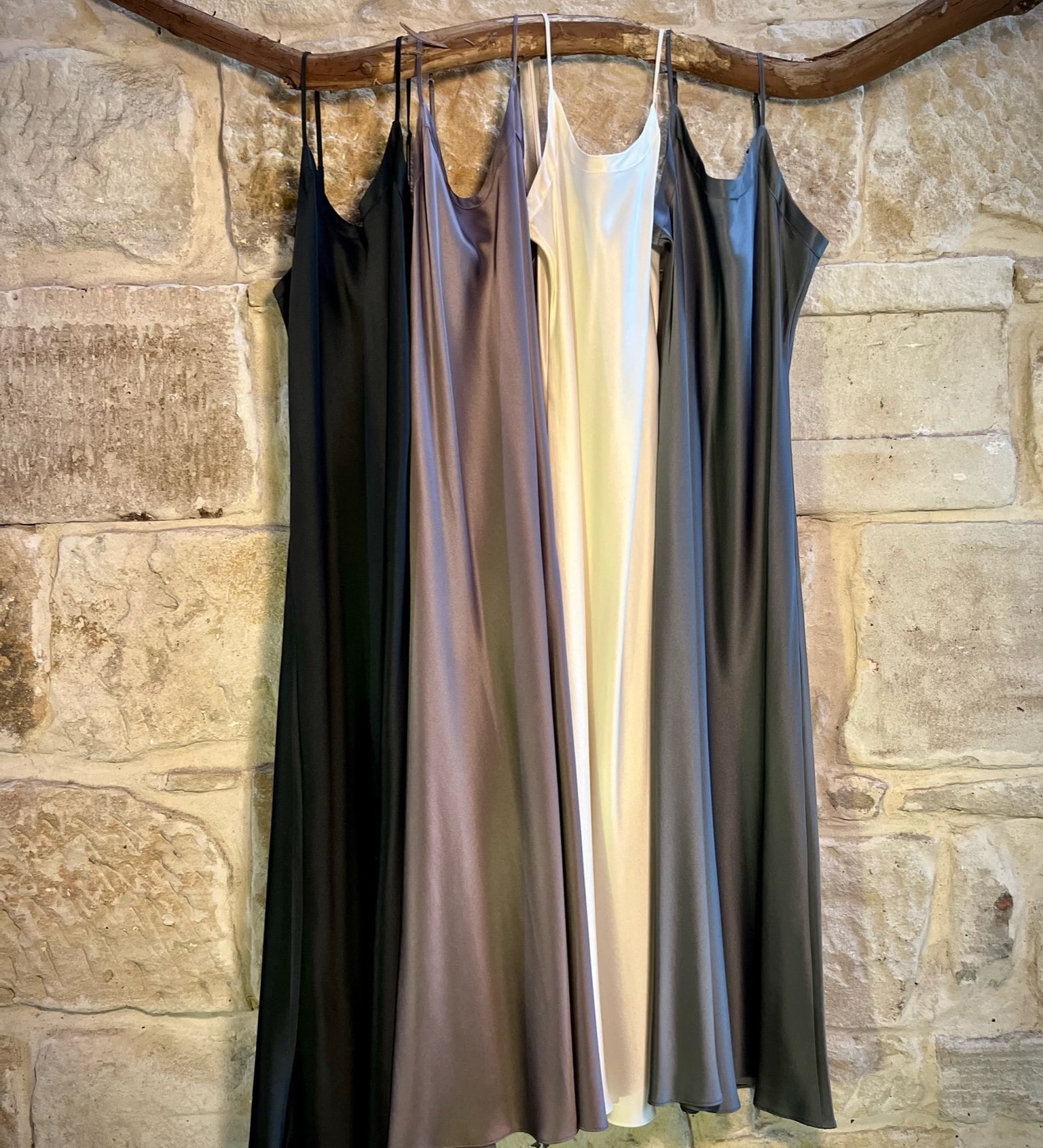 collection of lotus silk long chemises in various colours