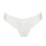 Marie Jo Jane Thong Brief in Natural from The Foundation, with floral embroidery, sheer lace, and pearl-detailed bows at the back.