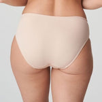 Model in PrimaDonna Deauville Full Brief in Café Latte from The Foundation, featuring high-waisted fit and decorative embroidery on the hips. back view