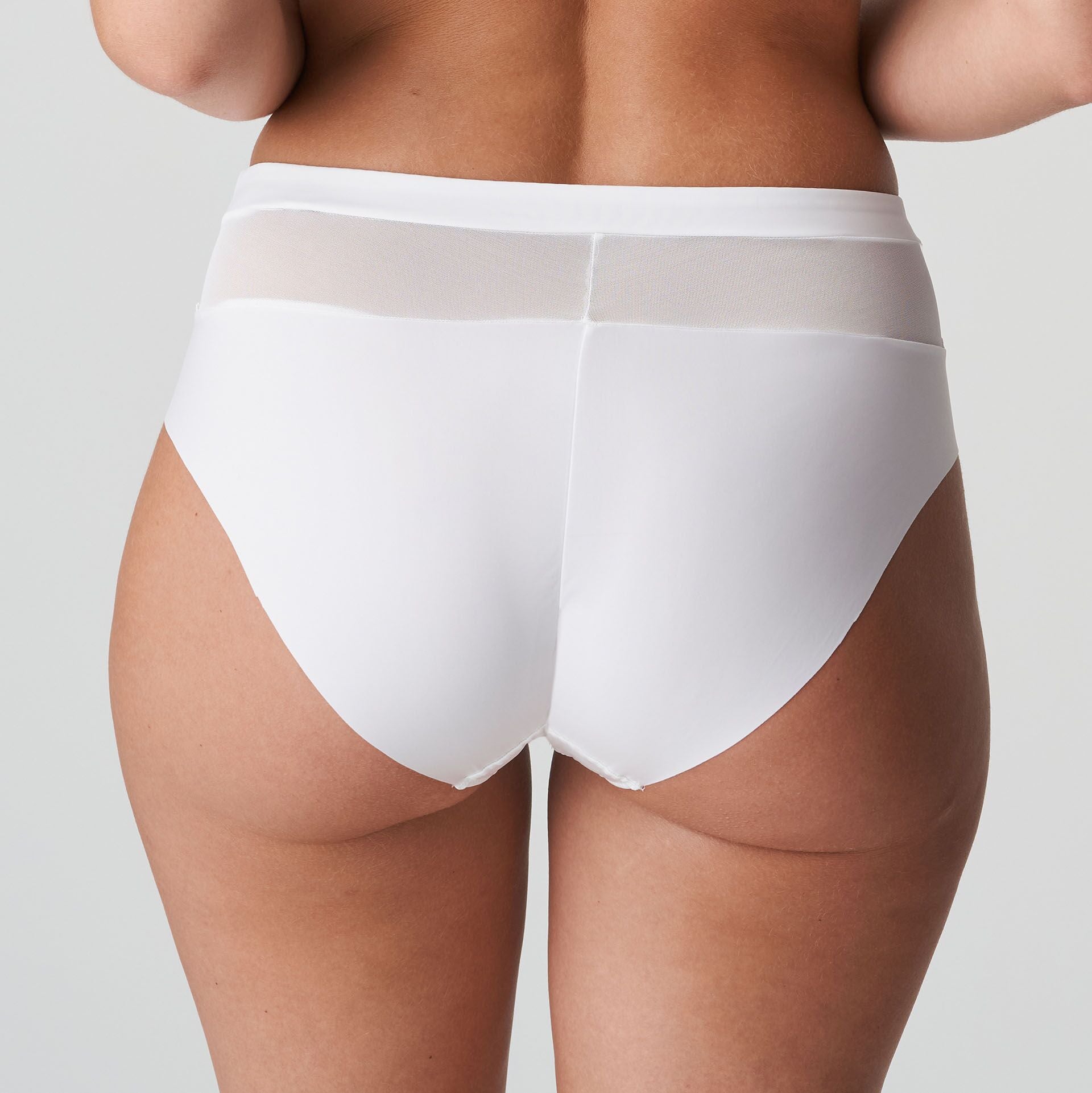 Back view of PrimaDonna Sophora brief in White, highlighting seam-free finish and medium-to-full coverage.