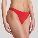 Side angle of Tom Thong in Scarlet by Marie Jo, highlighting low-rise fit and flawless, invisible edges.