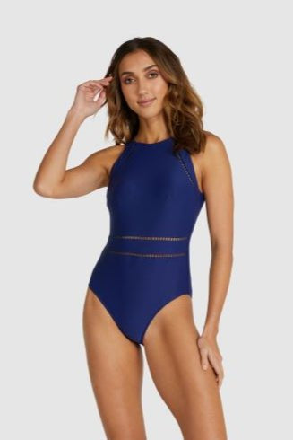 Model wearing Baku Rococco High Neck One Piece in Admiral with keyhole neckline and sleek fit.