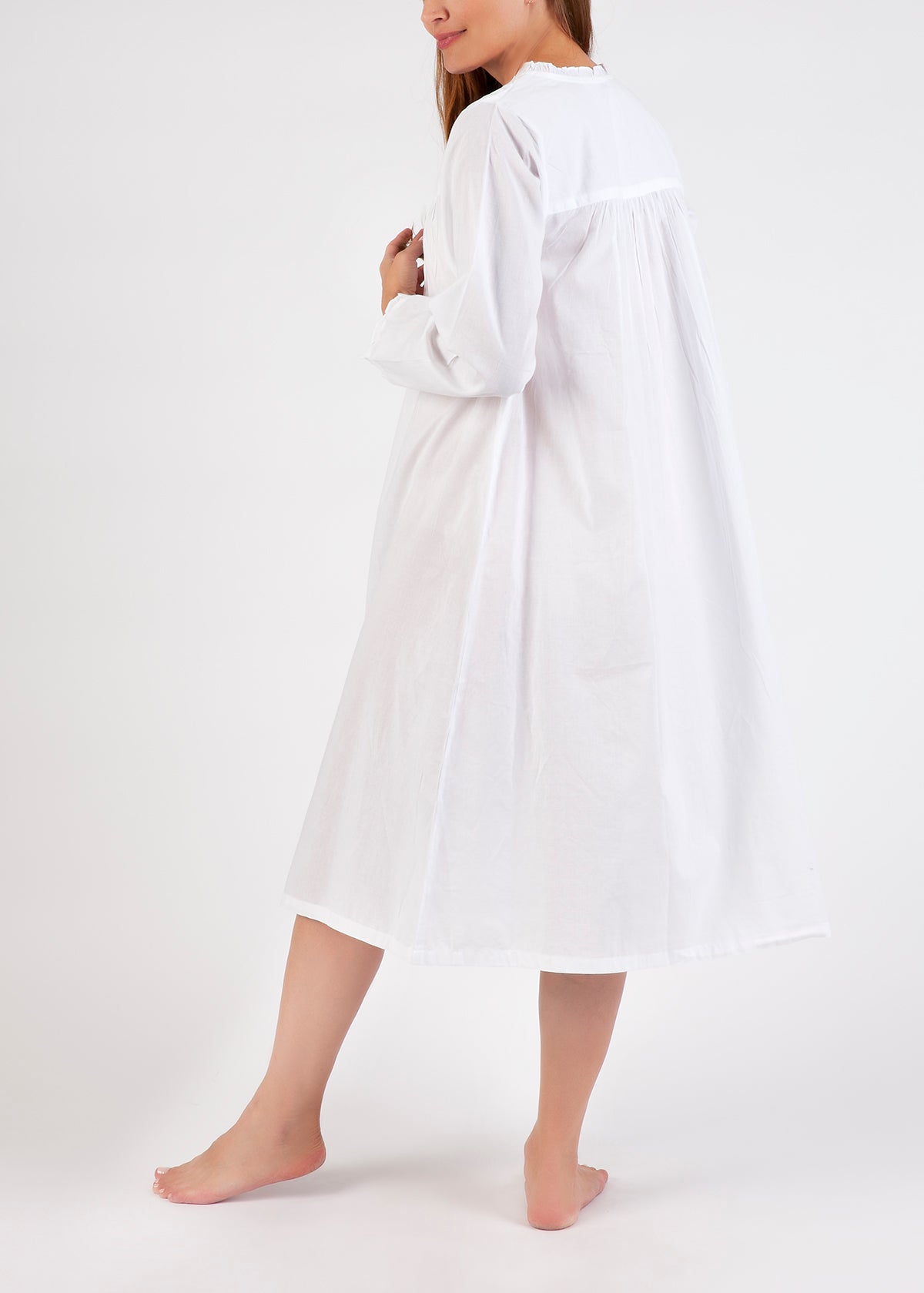 Long Sleeve Embroidered Nightie in white, side view highlighting relaxed fit, below-knee length, and delicate detailing.
