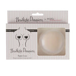 Secret Weapons Headlight Dimmers Round Nude silicone nipple covers in retail packaging.
