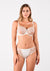 Full model shot in Perla Thong Ivory with matching Soft High Apex Bra – The Foundation