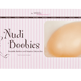Packaging of Secret Weapons Nudie Boobies silicone stick-on bra in nude tone.