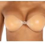 Model wearing Nudie Boobies silicone bra enhancer for invisible lift and cleavage boost.