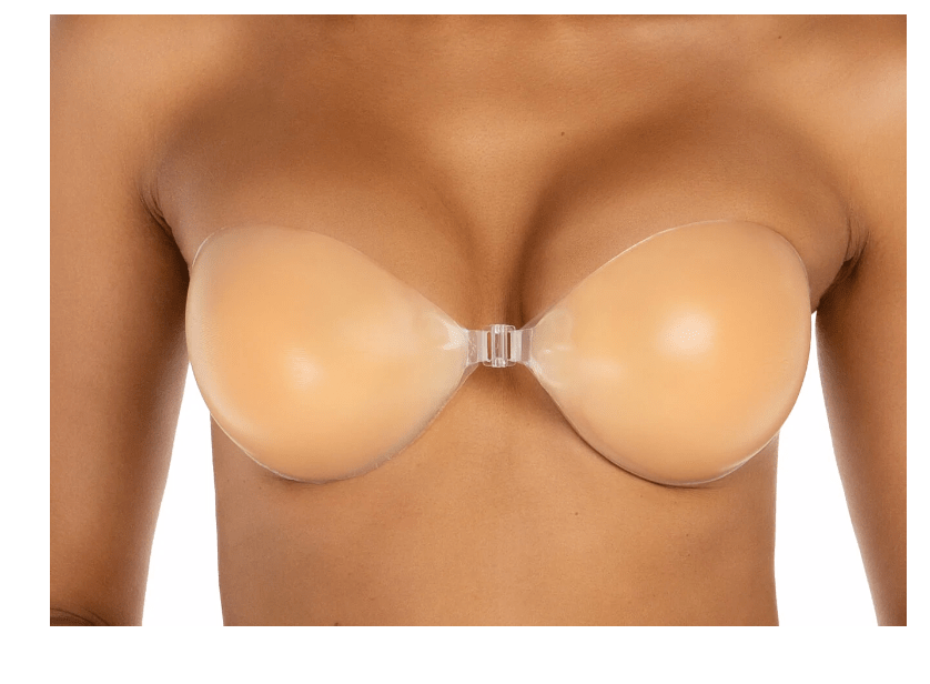 Model wearing Nudie Boobies silicone bra enhancer for invisible lift and cleavage boost.