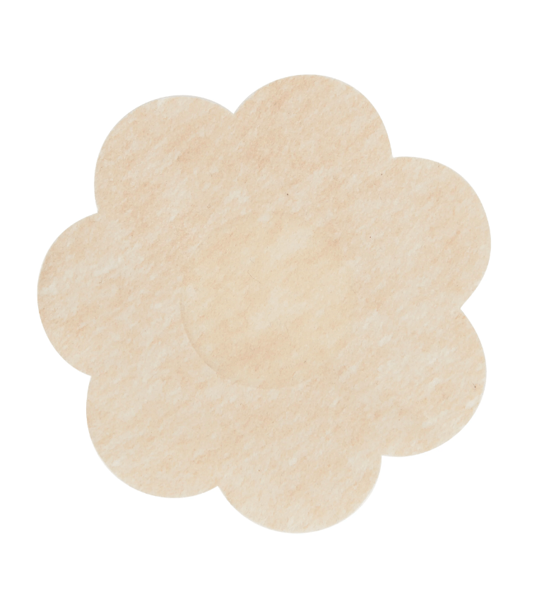 Single flower-shaped nude nipple cover for discreet use under clothing.