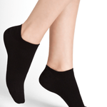 Model wearing Duo Mini Sox Twin Pack Cotton Noir by Bleuforet, available at The Foundation, featuring black low-cut no-show sport socks for women.