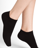 Model wearing Duo Mini Sox Twin Pack Cotton Noir by Bleuforet, available at The Foundation, featuring black low-cut no-show sport socks for women.