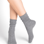 Model wearing Wool Cashmere Socks Mid Gris Flanelle by Bleuforêt, available at The Foundation, featuring soft and warm grey socks for women.