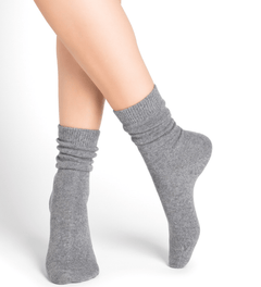 Model wearing Wool Cashmere Socks Mid Gris Flanelle by Bleuforêt, available at The Foundation, featuring soft and warm grey socks for women.