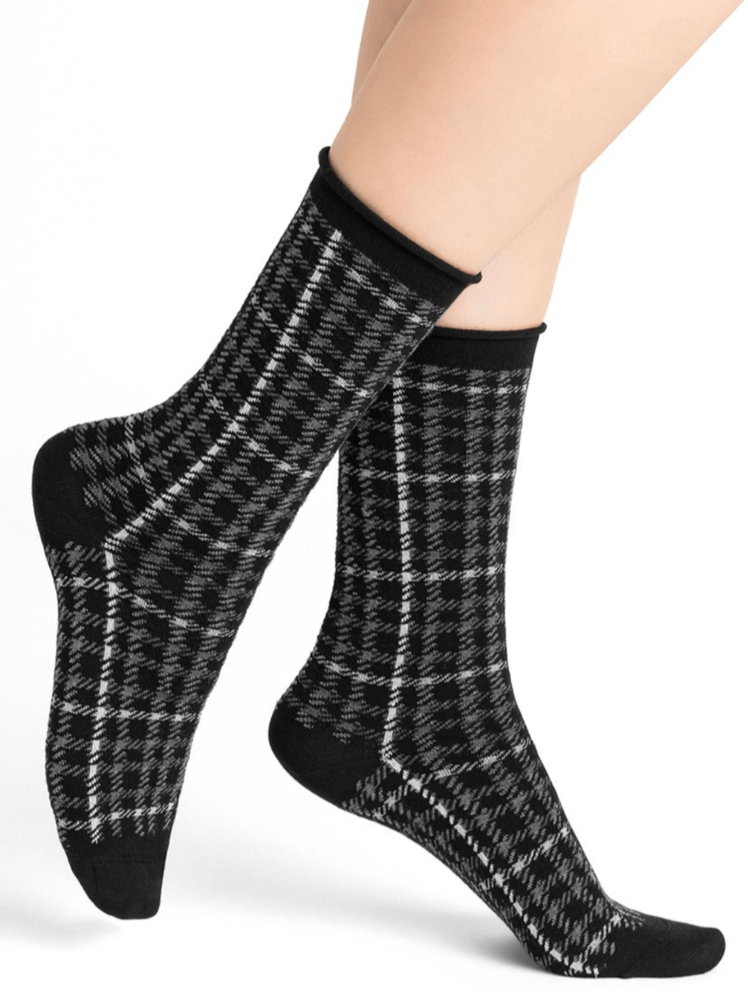 Model wearing Wool Blend Check Socks Mid Black by Bleuforêt, available at The Foundation, featuring black Prince of Wales check merino wool blend socks for women.